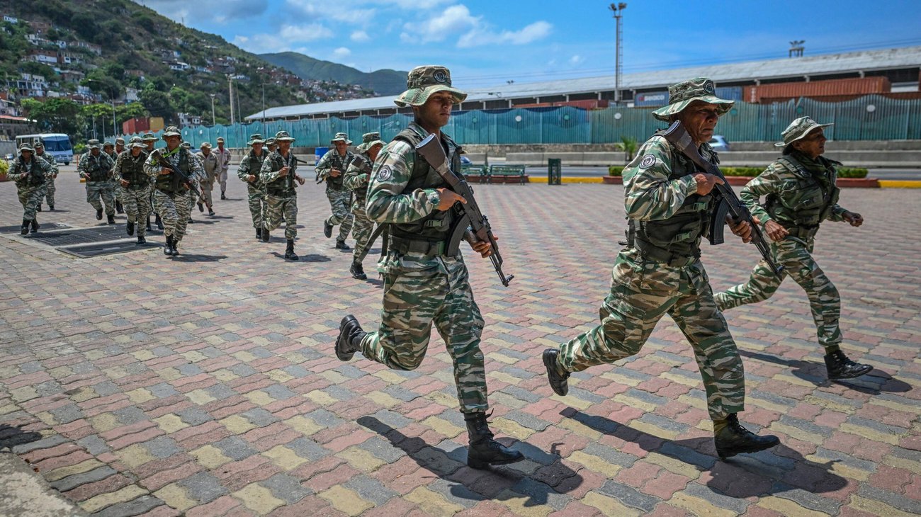 AFP_20251008_786_F963_v1_High_Res_Venezuela_Us_Politics_Conflict_Military_scaled_e711458512