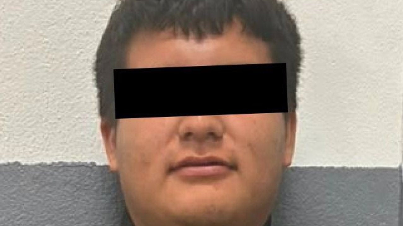 Detienen a hombre por presuntamente amenazar a comerciante