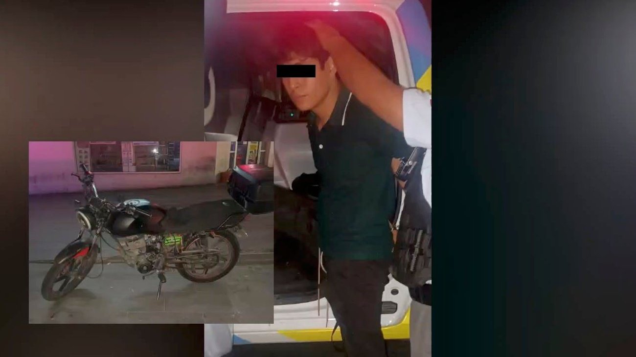 Lo detienen por circular en moto con placa colgada