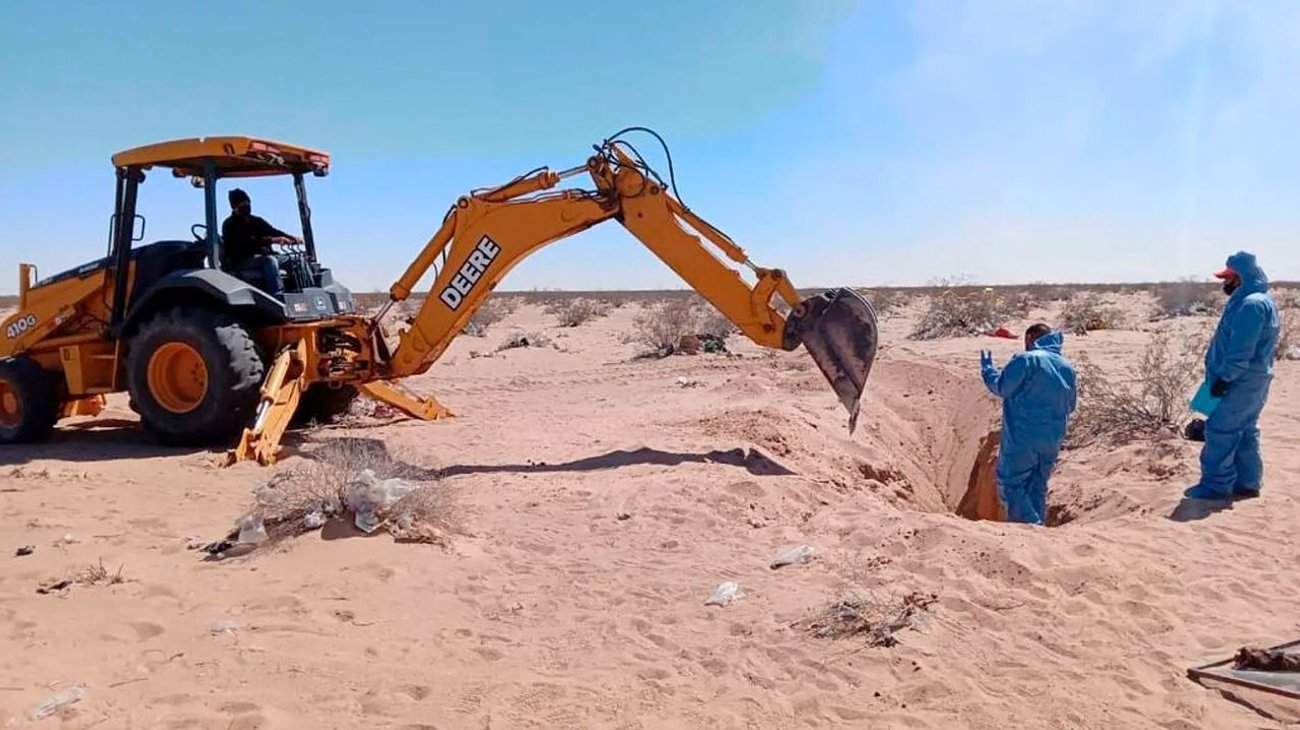 Encuentran dos cuerpos en fosas en frontera México-EUA