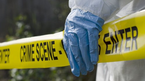 Localizan cuerpo atado a triciclo en canal de Tijuana
